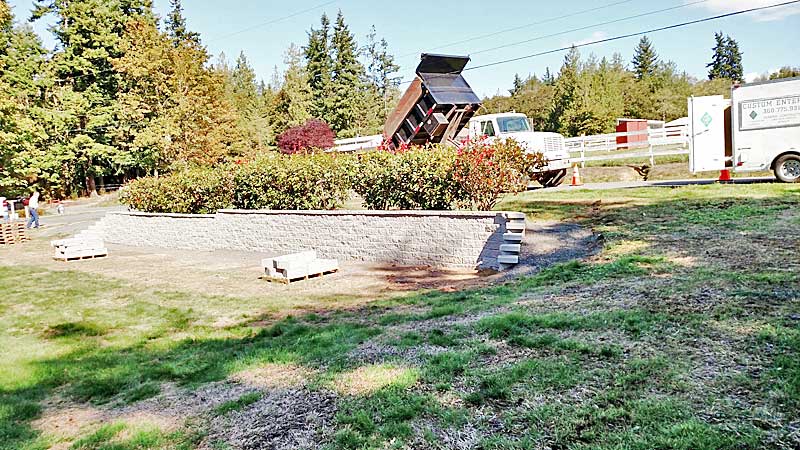 Contractor working on a residential roof and deck